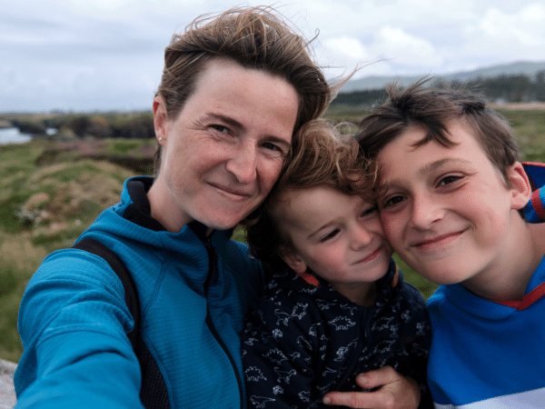 Mum with two children on the coast